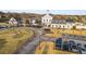 Aerial view of Hamilton Mill Golf & Country Club clubhouse and parking at 3352 Forest Vista Dr, Dacula, GA 30019