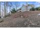 House exterior back view, sloped backyard at 3352 Forest Vista Dr, Dacula, GA 30019