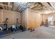 Basement gym with weight bench, weights, and other equipment at 3352 Forest Vista Dr, Dacula, GA 30019