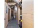 Basement hallway with access to various rooms and utilities at 3352 Forest Vista Dr, Dacula, GA 30019
