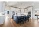 Modern kitchen with white cabinets, large island, and stainless steel appliances at 3352 Forest Vista Dr, Dacula, GA 30019