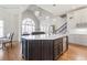 Gourmet kitchen featuring a large island, custom cabinetry, and high-end appliances at 3352 Forest Vista Dr, Dacula, GA 30019