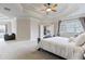 Luxurious main bedroom with large windows, high ceilings, and an ensuite bathroom at 3352 Forest Vista Dr, Dacula, GA 30019
