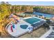 Aerial view of pool, playground, and tennis courts at 3352 Forest Vista Dr, Dacula, GA 30019