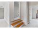 Elegant staircase connecting the upper and lower levels at 3352 Forest Vista Dr, Dacula, GA 30019