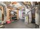 Basement storage area with shelving and various items at 3352 Forest Vista Dr, Dacula, GA 30019