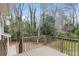 Backyard deck overlooks tree-lined green space at 2808 Mountbery Dr, Snellville, GA 30039