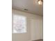Bright carpeted bedroom with closet space and a window for natural light at 2808 Mountbery Dr, Snellville, GA 30039