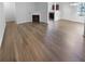 Hardwood floors in open concept living room with fireplace at 5165 Hanover St, Atlanta, GA 30349