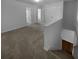 Upstairs hallway with access to bedrooms and closets at 5165 Hanover St, Atlanta, GA 30349