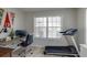 Home office with desk, chair, and treadmill at 2135 N Forest Trl, Atlanta, GA 30338