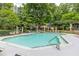 Community swimming pool with plenty of lounge chairs at 2135 N Forest Trl, Atlanta, GA 30338