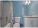 Clean bathroom with granite vanity and updated shower at 3590 Ashley Woods Dr, Powder Springs, GA 30127