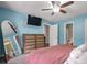 Bright bedroom with a queen-size bed and large mirror at 3590 Ashley Woods Dr, Powder Springs, GA 30127