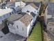 Aerial shot of a home showcasing the roof, backyard, and proximity to neighboring properties at 6725 Cross Gate St, Cumming, GA 30040