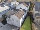 Aerial view showcasing the house, detached garage, and backyard at 6725 Cross Gate St, Cumming, GA 30040