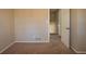 Simple bedroom with neutral walls and carpet flooring at 2668 Woodfen Dr, Ellenwood, GA 30294