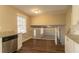 Kitchen with granite countertops and stainless steel appliances at 2668 Woodfen Dr, Ellenwood, GA 30294