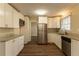 Bright kitchen with stainless steel appliances and granite countertops at 2668 Woodfen Dr, Ellenwood, GA 30294