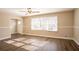 Bright living room with hardwood floors and neutral walls at 2668 Woodfen Dr, Ellenwood, GA 30294