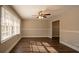 Sunlit living room with hardwood floors and neutral decor at 2668 Woodfen Dr, Ellenwood, GA 30294