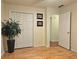 Well-lit bedroom with hardwood floors and double door closet at 3380 Rock Creek Dr, Rex, GA 30273