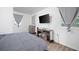 Spacious bedroom with large TV and plenty of floor space at 1847 Elmwood Dr, Austell, GA 30106
