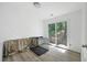 Multi-purpose room with sliding glass door to backyard at 1847 Elmwood Dr, Austell, GA 30106