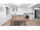 Dining room with a large wooden table and gray chairs at 1847 Elmwood Dr, Austell, GA 30106
