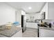 Modern kitchen with white cabinets and granite countertops at 1847 Elmwood Dr, Austell, GA 30106