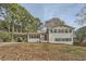 Two-story house with carport and landscaped yard at 4809 Hemlock Sw Dr, Austell, GA 30106