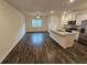 Open concept kitchen with granite island and stainless steel appliances at 449 Broder Farms Dr, Stockbridge, GA 30281