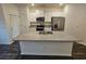 Modern kitchen featuring granite countertops and white cabinets at 449 Broder Farms Dr, Stockbridge, GA 30281