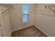 Large walk-in closet with window and shelving at 449 Broder Farms Dr, Stockbridge, GA 30281