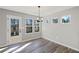 Dining area with wood floors and lots of natural light at 1002 Rainier Dr, Euharlee, GA 30145