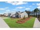 Charming single-story home with a well-manicured lawn and side-walk at 1002 Rainier Dr, Euharlee, GA 30145