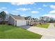 Charming single-story home with a well-manicured lawn and a long driveway at 1002 Rainier Dr, Euharlee, GA 30145