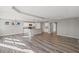 Spacious living room with an open layout, wood flooring, and abundant natural light at 1002 Rainier Dr, Euharlee, GA 30145