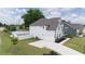 Two story home, white exterior, two car garage, landscaped yard at 301 Rexmere Rd, Mcdonough, GA 30252