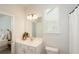 Bathroom with single vanity, toilet and window at 301 Rexmere Rd, Mcdonough, GA 30252