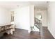 Open dining room with rustic farmhouse table and bench seating at 301 Rexmere Rd, Mcdonough, GA 30252