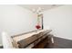 Bright dining room with a rustic farmhouse table and bench at 301 Rexmere Rd, Mcdonough, GA 30252