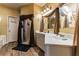 Bathroom with double vanity and a walk-in shower at 570 Pleasant Grove Rd, Mcdonough, GA 30252