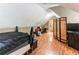 Spacious bedroom with hardwood floors and ample space at 570 Pleasant Grove Rd, Mcdonough, GA 30252