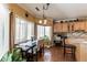Bright kitchen breakfast nook with wood floors at 570 Pleasant Grove Rd, Mcdonough, GA 30252