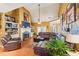 Spacious living room with a large sectional sofa and fireplace at 570 Pleasant Grove Rd, Mcdonough, GA 30252