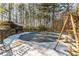 Above ground pool in winter setting with snow cover at 570 Pleasant Grove Rd, Mcdonough, GA 30252