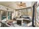 Spacious screened porch, perfect for outdoor entertaining at 570 Pleasant Grove Rd, Mcdonough, GA 30252