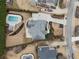Overhead view of house, landscaping, and pool at 206 Woodridge Pkwy, Canton, GA 30115