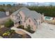 Impressive two-story home with pool and lush landscaping at 206 Woodridge Pkwy, Canton, GA 30115